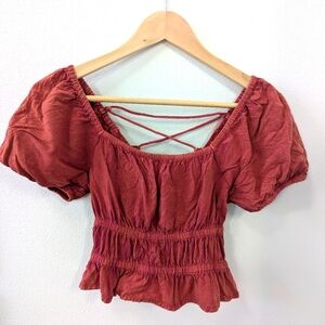 Rebellion again S orange crop top